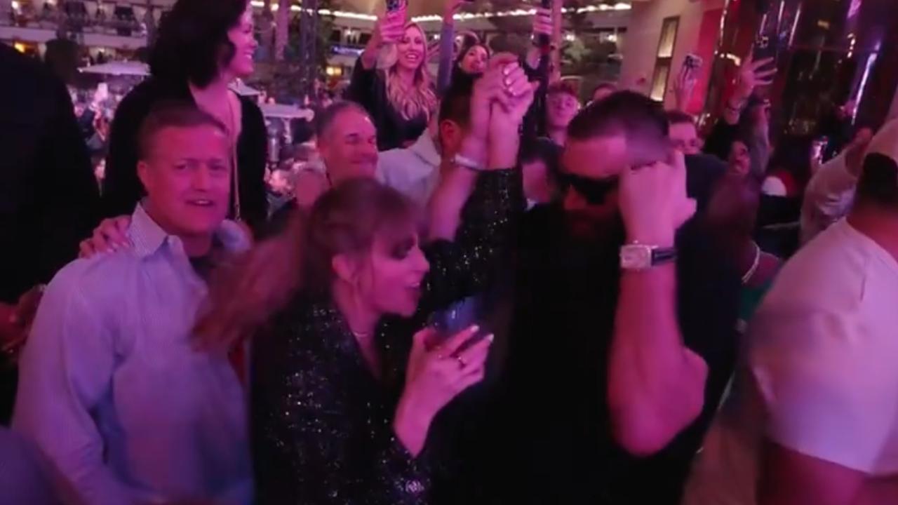 Taylor Swift held centre court at the Kansas City Chief's victory party kissing and dancing to her own songs with boyfriend star player Travis Kelce. Picture: X