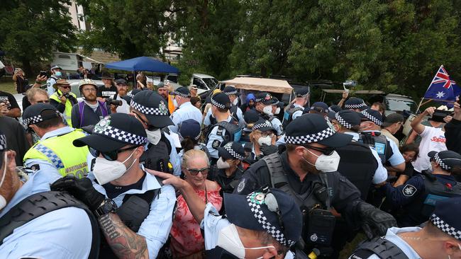 Police and protesters clash near the entrance to the National Library in Canberra. Picture: NCA/Gary Ramage