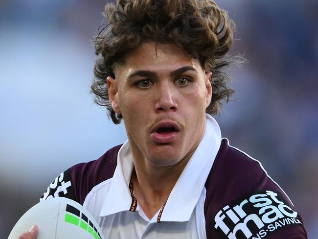 GOLD COAST, AUSTRALIA - AUGUST 03: Reece Walsh of the Broncos takes on the defence during the round 22 NRL match between Gold Coast Titans and Brisbane Broncos at Cbus Super Stadium, on August 03, 2024, in Gold Coast, Australia. (Photo by Matt Roberts/Getty Images)