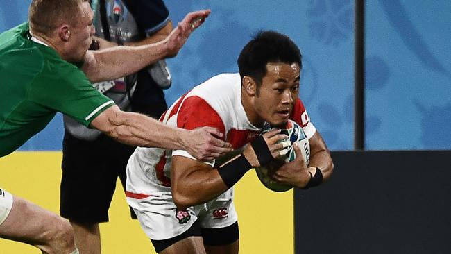 Japanese winger Kenki Fukuoka dives over to score. Picture: AFP