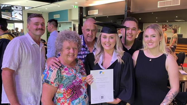 UniSC graduates celebrate at the Brolga Theatre in Maryborough, Qld.