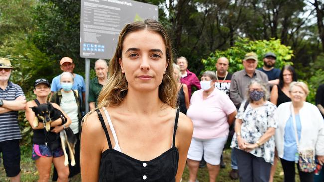 Sunshine Coast Council has set a proposal to clear some of Caloundra’s Ben Bennett Park bushland for a four-lane road. Pictured is Jasmyne Case with local residents who oppose the project. Photo: Patrick Woods.