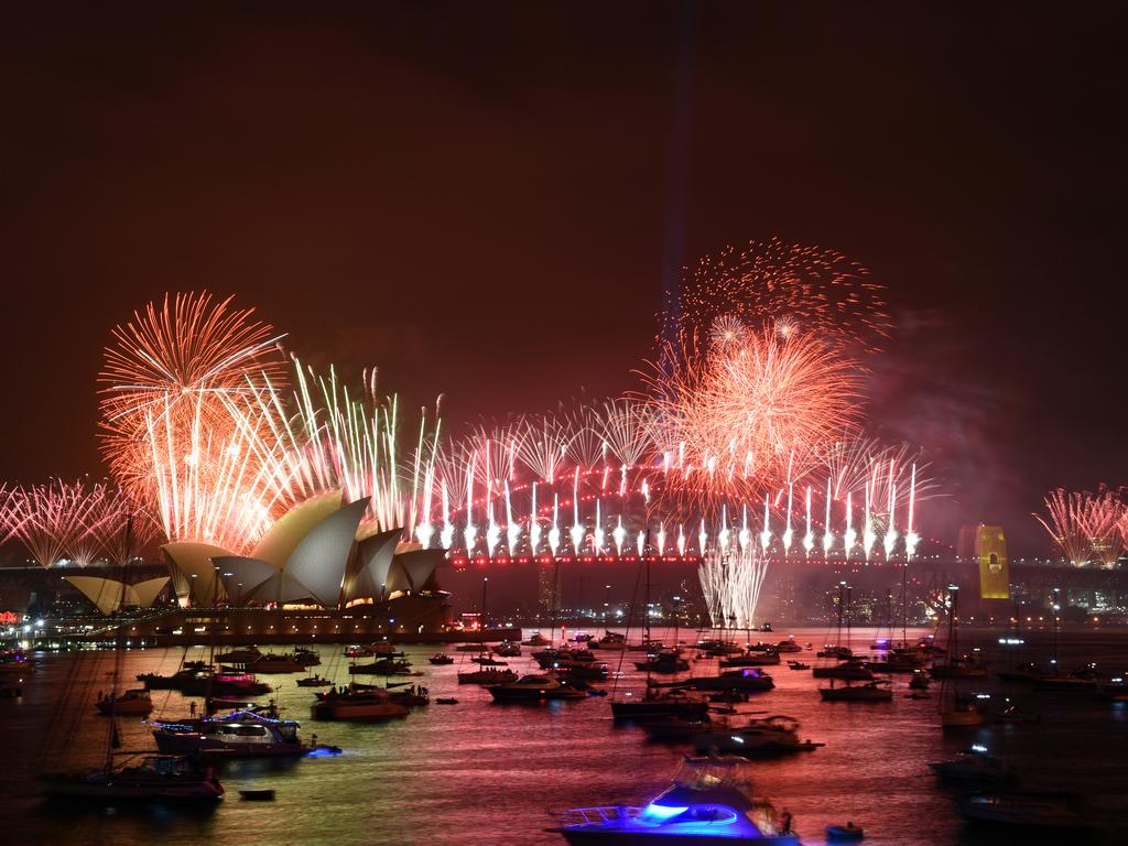 The midnight fireworks are seen from Mrs Macquarie's Chair during New Year's Eve celebrations in Sydney, Tuesday, December 31, 2019. (AAP Image for City of Sydney/Mick Tsikas)