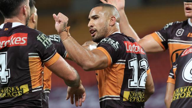 Jamil Hopoate celebrates after the Round 2 NRL game between the Brisbane Broncos and the South Sydney Rabbitohs at Suncorp Stadium, Brisbane. Pics Adam Head