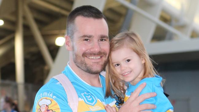 Titans vs. Dolphins at Cbus Stadium.Daniel and Ella-Rose Ferguson.30 March 2024 Robina Picture by Richard Gosling