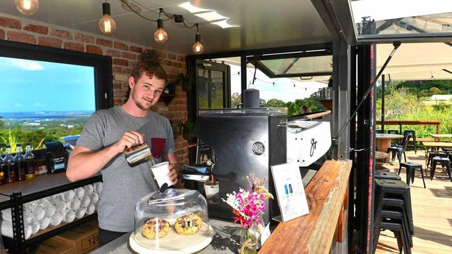 BUSINESS VISION: Jaydn Langdon, 23, has big plans for his shipping-container cafe Rue Bourbon, which sits on one of the Coast's prime locations with ocean views. Picture: John McCutcheon