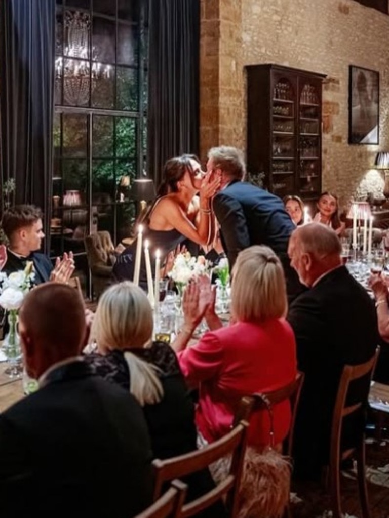 Victoria and David share a kiss at his 50th. Photo: Instagram