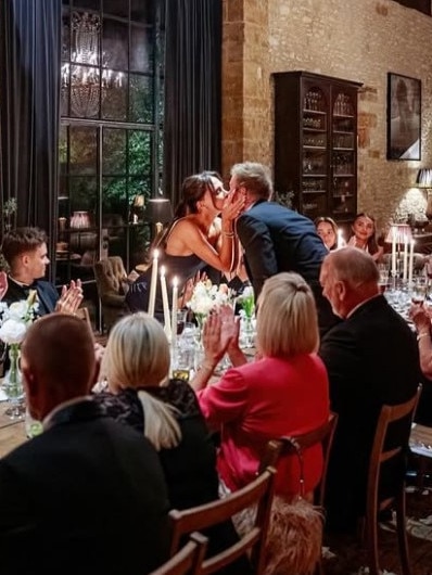 Victoria and David share a kiss at his 50th. Photo: Instagram