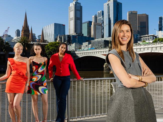 Erin Deering in Melbourne CBD With models:Rhiannan Callaghan, 22 (mini red dress)Naya Hoskins, 23 (multi coloured dress)Alysia Salley, 21, (red vest)