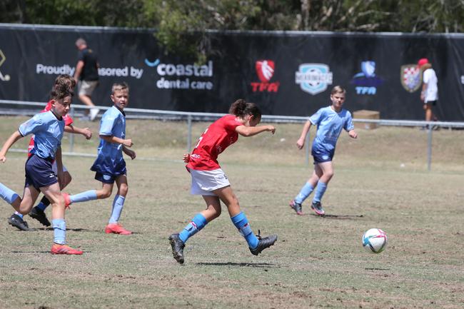 The Premier Invitational football tournament on the Gold Coast. Gold Coast Knights Red v Springfield United under-13s in action. Picture: Mike Batterham.