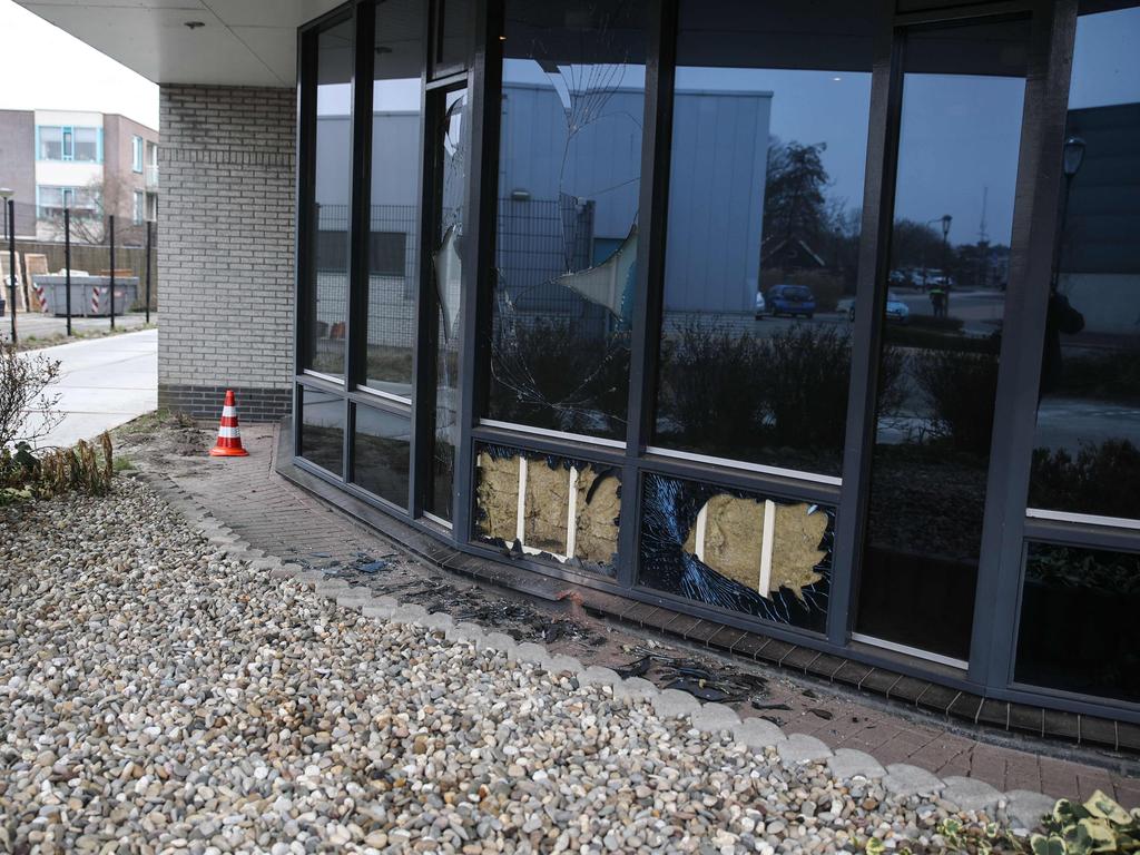 Broken windows of a COVID-19 testing centre in Bovenkarspel, northern Netherlands, following an explosion. Picture: AFP