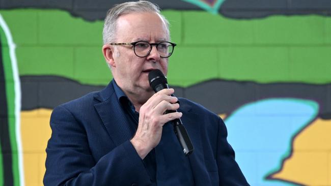 Australian Prime Minister Anthony Albanese speaks to students as he attends a school assembly at Stuart Park Primary in Darwin, NT, Wednesday, March 13, 2024. (AAP Image/Lukas Coch) NO ARCHIVING