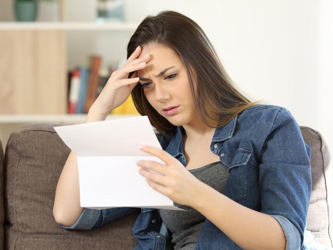 woman shocked at electricity bill generic