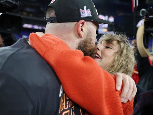 BALTIMORE, MARYLAND - JANUARY 28: Travis Kelce #87 of the Kansas City Chiefs celebrates with Taylor Swift after a 17-10 victory against the Baltimore Ravens in the AFC Championship Game at M&T Bank Stadium on January 28, 2024 in Baltimore, Maryland. (Photo by Patrick Smith/Getty Images) ***BESTPIX***