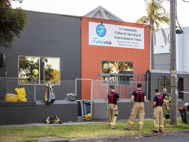 Firefighters at the scene of the Furlan Club fire. Picture: Jake Nowakowski