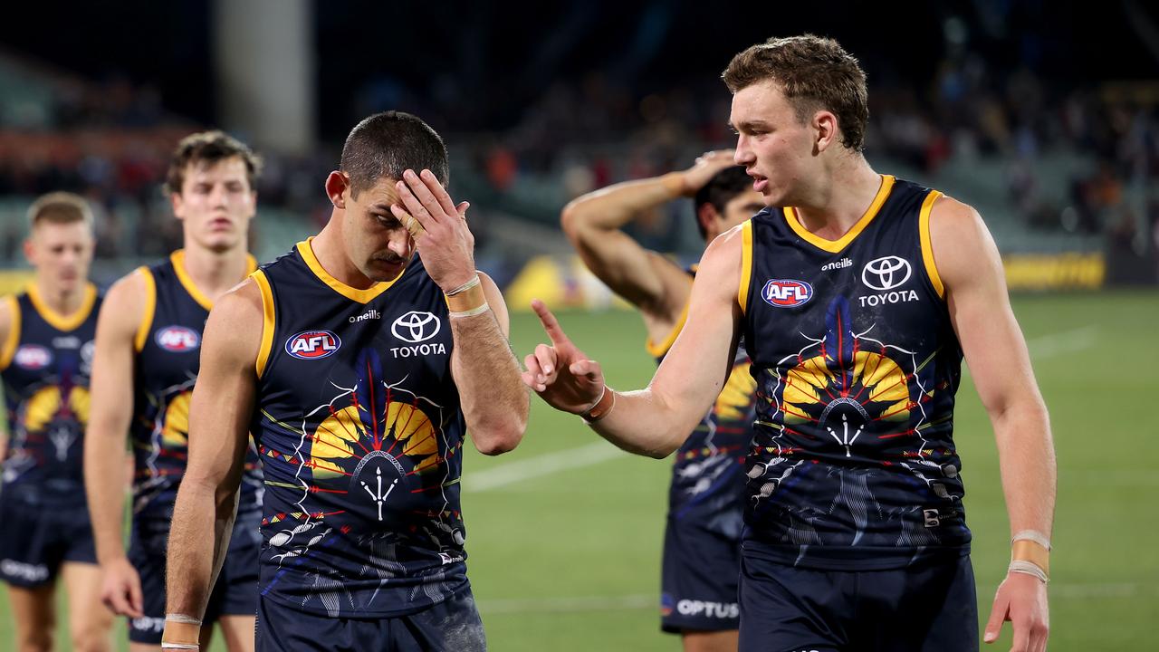 Taylor Walker and Riley Thilthorpe look gutted after the loss. Picture: James Elsby/AFL Photos via Getty Images