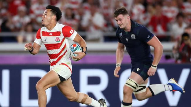 Kenki Fukuoka breaks clear to score their Japan’s fourth try against Scotland in a performance that epitomised everything that is good about rugby. Picture: Cameron Spencer/Getty Images