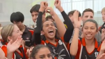 The Benowa State High School Year 8 girls team celebrates after their triumph in the Australian Volleyball Schools Cup in December. Picture: Volleyball Australia