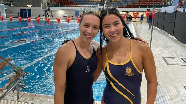 St Margaret's Sophie Martin, left, earlier this year with Clayfield College's Hana Costello at the QGSSSA.