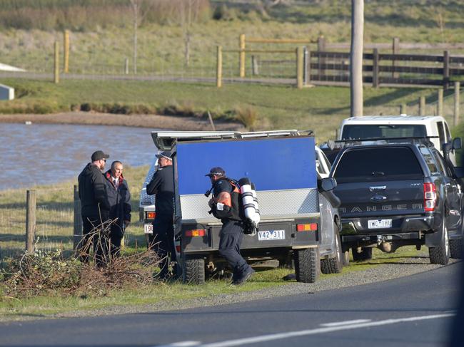 Police divers arrive at the scene. Picture: Ian Wilson