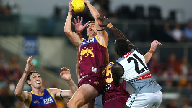 Joe Daniher takes a towering mark against Port Adelaide. Picture: AFL Photos/via Getty Images