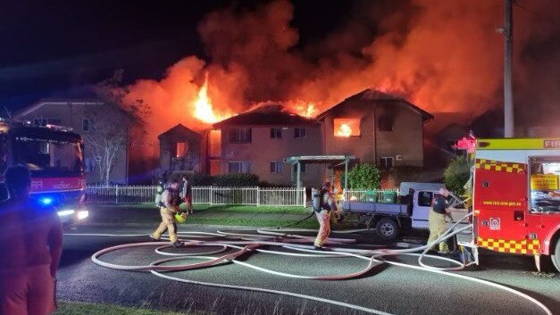 FRNSW firefighters extinguishing a house fire in Taree. Picture: Fire and Rescue NSW