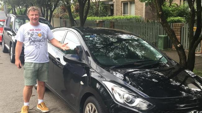 Leichhardt businessman Shane McCarthy is fighting the Inner West Council over a parking ticket he claims he received from "predatory" parking rangers who issued him an infringement notice while he was at the parking ticket machine.