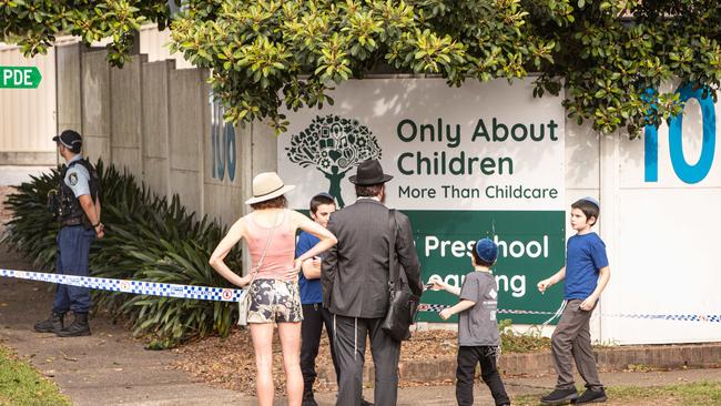 Members of the local Jewish community in Maroubra arrive with their children at the childcare centre that was firebombed in an anti-Semitic attack. Picture: NewsWire/ Julian Andrews