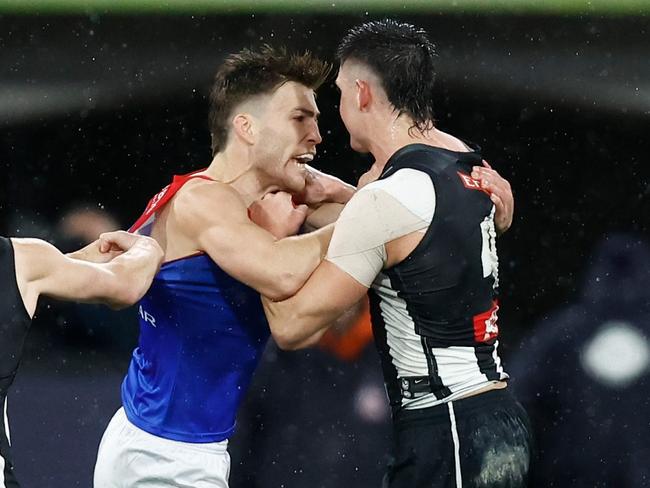 MELBOURNE, AUSTRALIA - SEPTEMBER 07: Brayden Maynard of the Magpies and Jack Viney of the Demons clash as Angus Brayshaw of the Demons leaves the field on a stretcher during the 2023 AFL First Qualifying Final match between the Collingwood Magpies and the Melbourne Demons at Melbourne Cricket Ground on September 07, 2023 in Melbourne, Australia. (Photo by Michael Willson/AFL Photos via Getty Images)