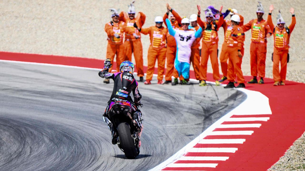 Aprilia Spanish rider Aleix Espargaro celebrates after winning the MotoGP Sprint Race of the Moto Grand Prix of Catalonia at the Circuit de Catalunya on May 25, 2024 in Montmelo on the outskirts of Barcelona. (Photo by Josep LAGO / AFP)