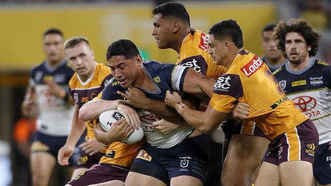 The Broncos try to stop Jason Taumalolo. Picture: AAP Image/Cameron Laird