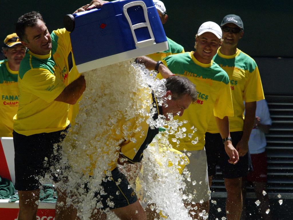 Team Australia celebrate winning the 2003 Davis Cup.