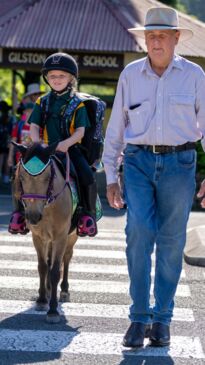 Prep student rides her horse to school