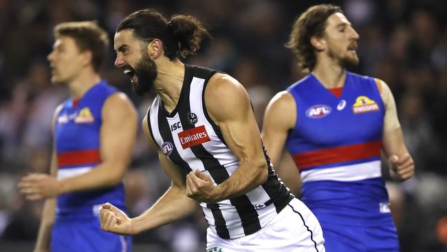 Brodie Grundy celebrates a goal against Western Bulldogs this season.