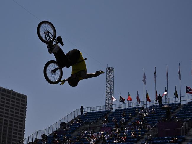 Logan Martin wows the crowd in the BMX freestyle event. Picture: AFP