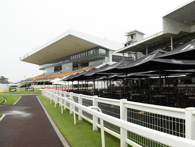 Rain falls during Family Raceday at Doomben Racecourse in Brisbane, Saturday, October 13, 2018. (AAP Image/Albert Perez) NO ARCHIVING, EDITORIAL USE ONLY