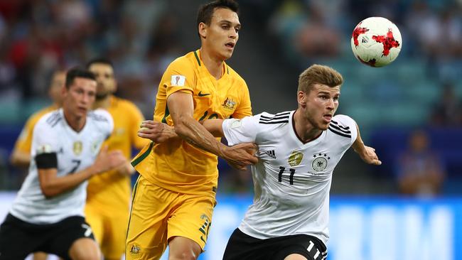 Trent Sainsbury has a tough time with Germany’s Timo Werner.
