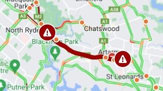 Sydney's Lane Cove Tunnel is closed in both directions because of a truck fire in the eastbound tunnel.