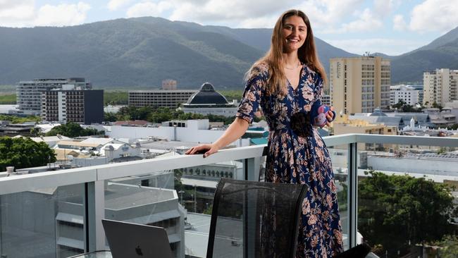 The city of Cairns is facing a bright, vibrant and sustainable future, with our natural attractions drawing in people from across Australia and overseas. Young professional Corrinne Singleton lives in the Cairns CBD and works from home, taking in the view over the city every day. Picture: Brendan Radke