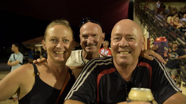 Spectators Melissa Wundersitz, Spike and Paul Rusinski at the NTFL 22/23 season opener. Picture: (A)manda Parkinson