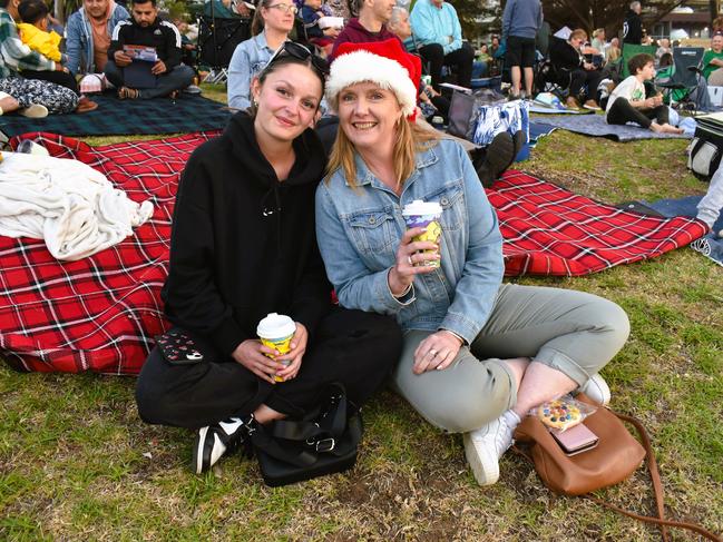 Grace Marceddo and Lisa Marceddo getting festive at the Phillip Island Christmas Carols by the Bay at the Cowes Foreshore on Tuesday, December 10, 2024. Picture: Jack Colantuono