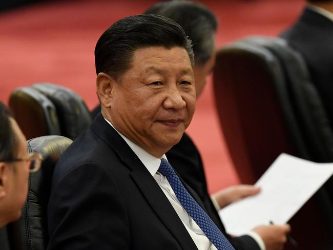 China's President Xi Jinping (C) attends a signing ceremony with Angola's president Joao Lourenco (not pictured) at the Great Hall of the People in Beijing on October 9, 2018. (Photo by Daisuke Suzuki / POOL / AFP)