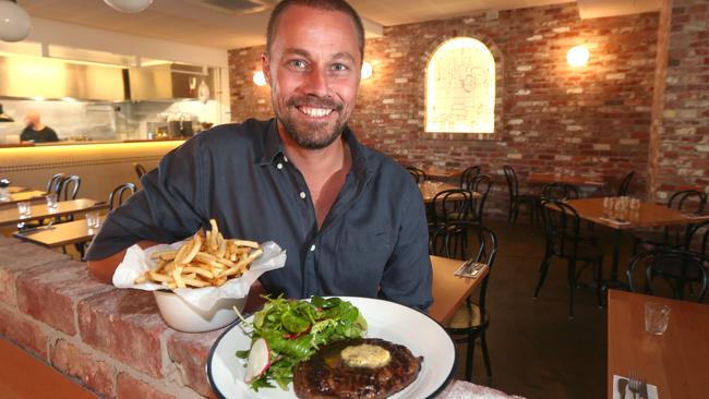 A round of applause for our 2017 Best of the Gold Coast steak winner — Harry's Steak Bistro and Bar at Burleigh Heads. Co-owner Pete Tayler with a scotch fillet steak. Picture Mike Batterham