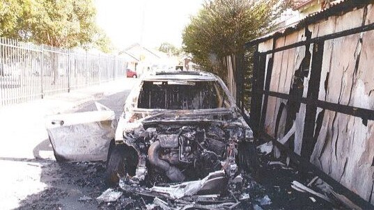 A burnt-out Mercedes-Benz allegedly used in the murder of Mick Hawi.