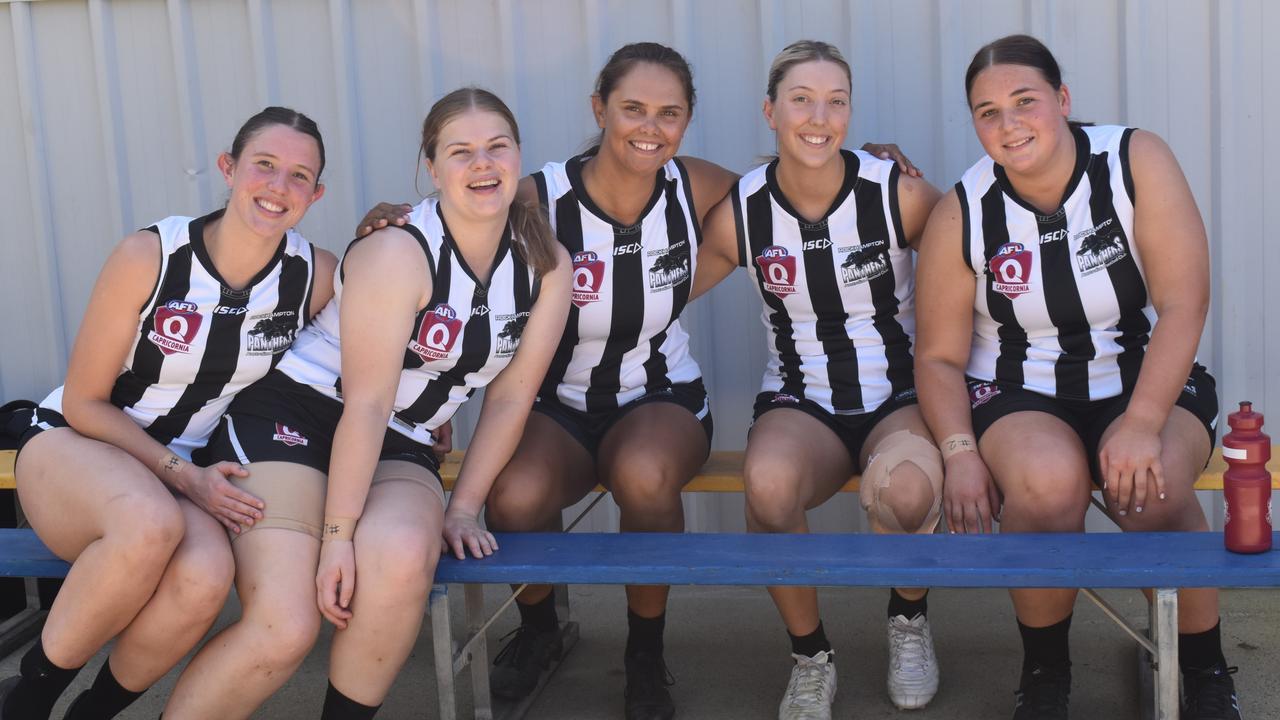 Panthers players Maddy Law, Castley Webb, Tyler Malone, Thea Whatmore and Annalise Corrie at the AFL Capricornia senior grand final day at Stenlake Park, Rockhampton, on August 31, 2024.