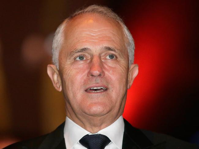 MELBOURNE, AUSTRALIA - JUNE 18: Priminster Malcolm Turnbull stands for the national anthem during the Prime Minister's Olympic Dinner at The Melbourne Convention and Exhibition Centre on June 18, 2016 in Melbourne, Australia. (Photo by Darrian Traynor/Getty Images)