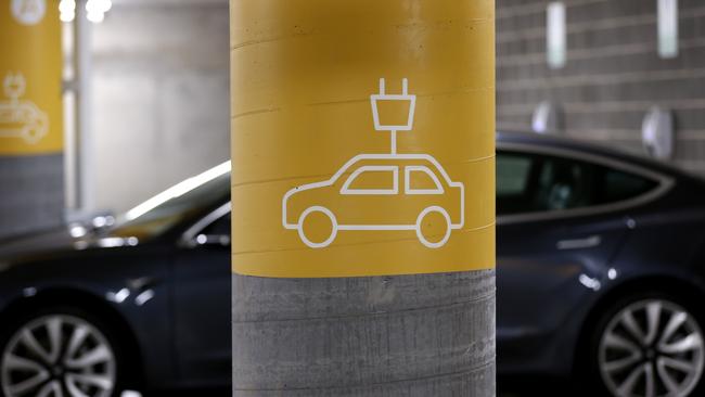 A Tesla Model Y charges at a Sydney EV charging station. Picture: Getty Images