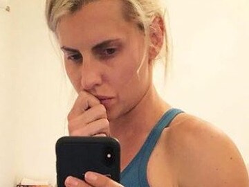 Tiff Hall says she is not pregnant, just bloated from stress and her period.