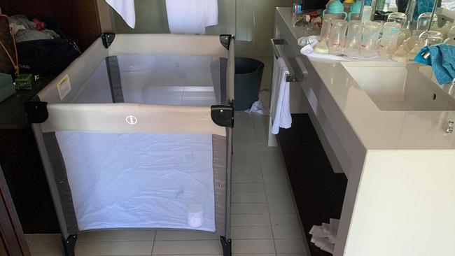 One family have chosen to put their son's cot in the bathroom as it's the only area which is sectioned off from the room. Picture: Supplied