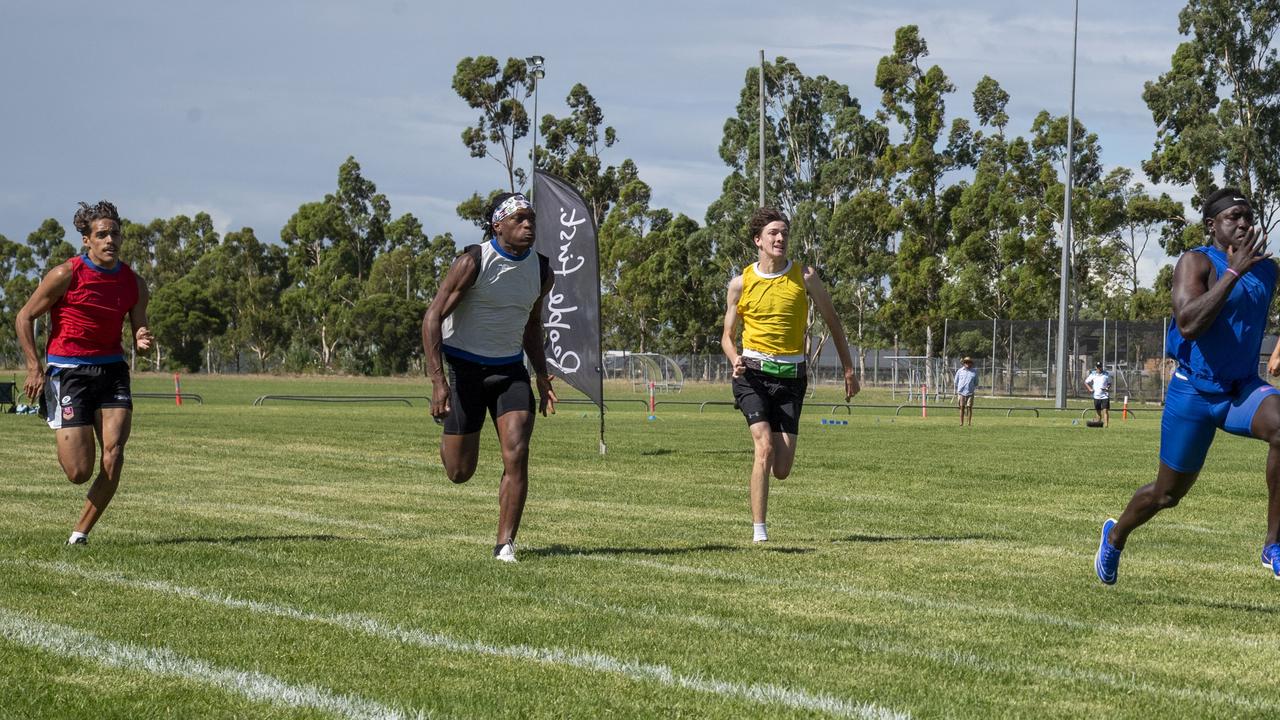 Anas Abu Ganaba (in blue) winner of the Moore Trailers 120 metres open. at the Arthur Postle Gift in Pittsworth. Saturday 18th January, 2025. Picture: Nev Madsen.